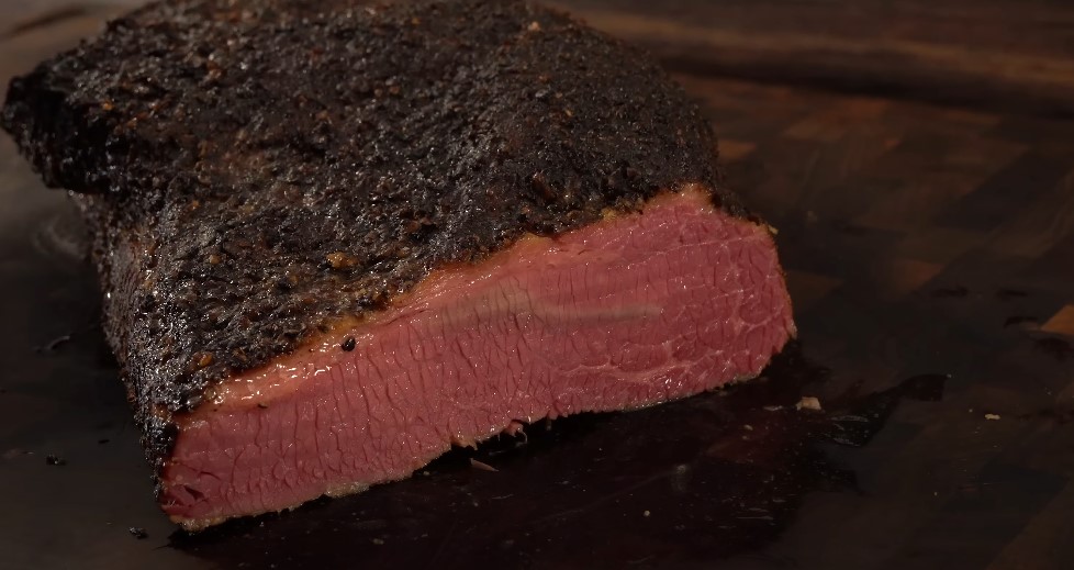 Smoked pastrami on a cutting board